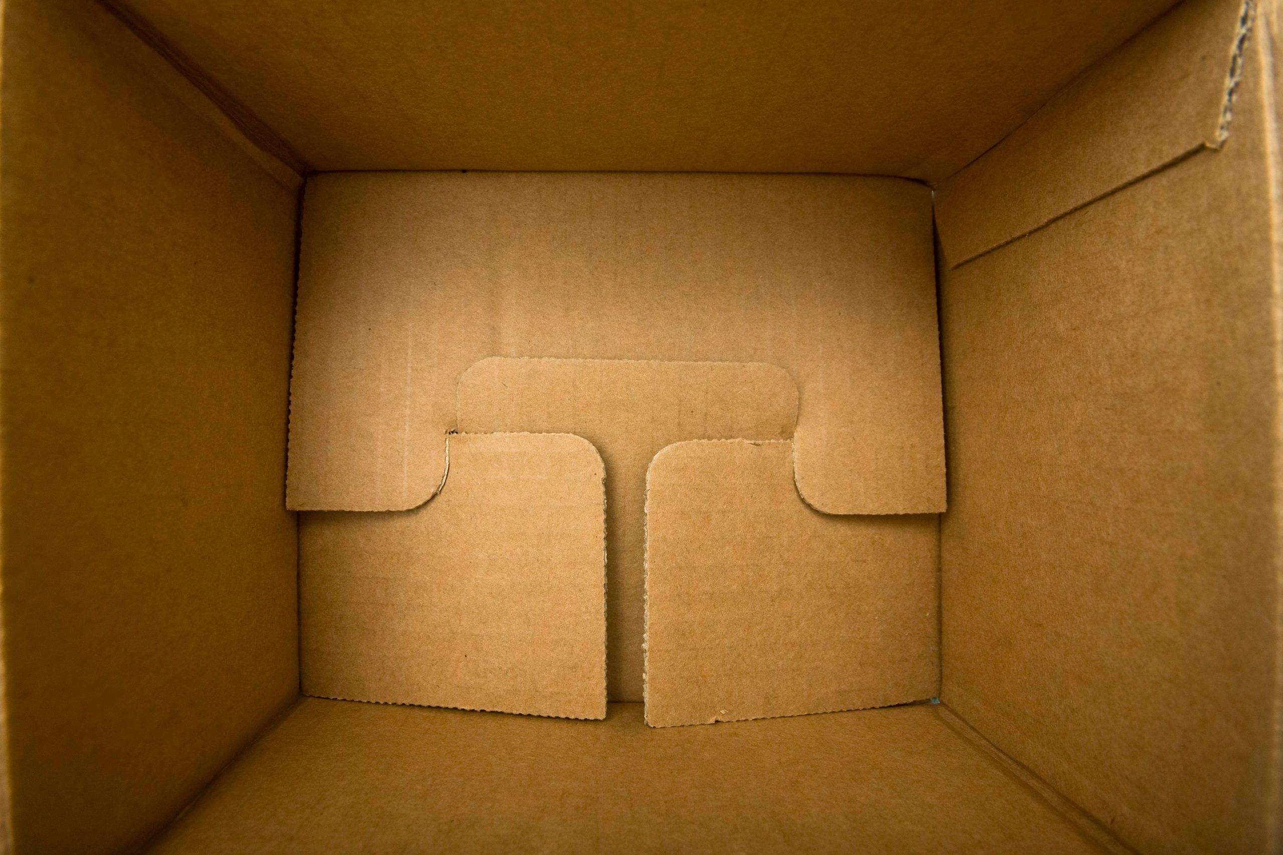 Open cardboard box with soft light